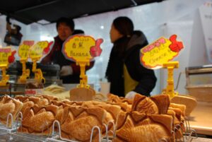 טאיאקי קוריאני חם ומתוק בדוכן רחוב | צילום: גולן לובנוב