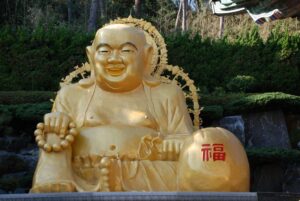 בודהה הצוחק במקדש לחוף הים בבוסאן | צילום: גולן לובנוב